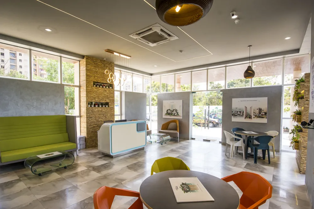 Modern corporate office lobby and open workspace layout designed by Studio Elements in Mumbai.